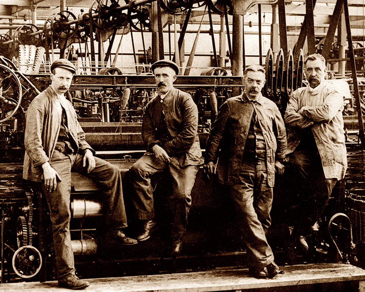 18th-century Manchester textile mills producing durable corduroy workwear fabric