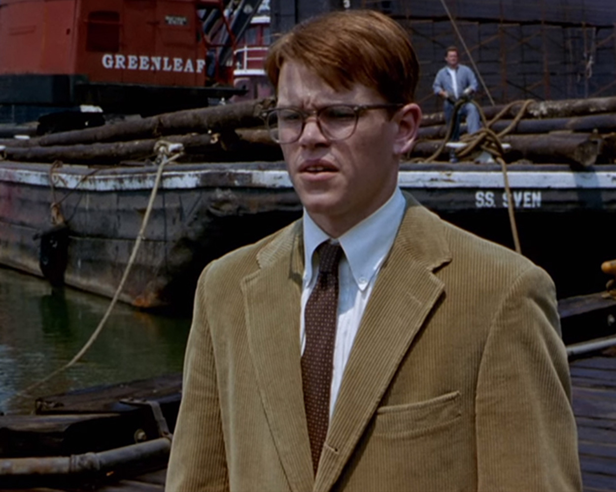 Matt Damon wearing a brown corduroy jacket in The Talented Mr. Ripley, symbolizing Ivy League realism