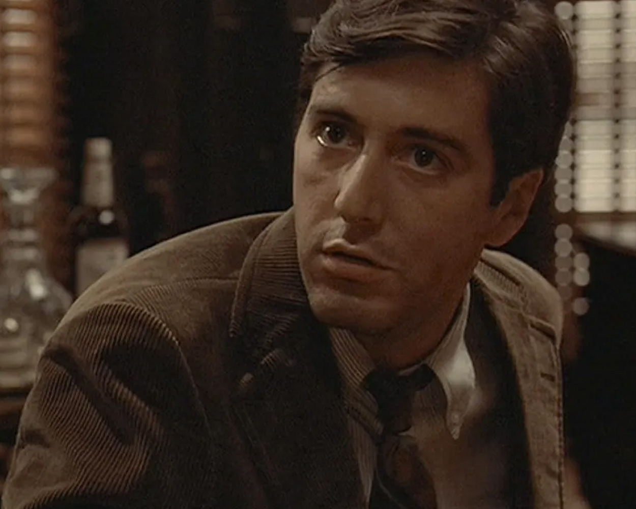 Classic brown corduroy suit representing the intellectual and practical spirit of American menswear