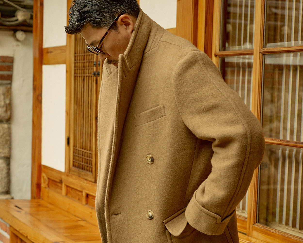 Renacts modern polo coat symbolizing timeless Ivy heritage reimagined through Seoul Trad Style