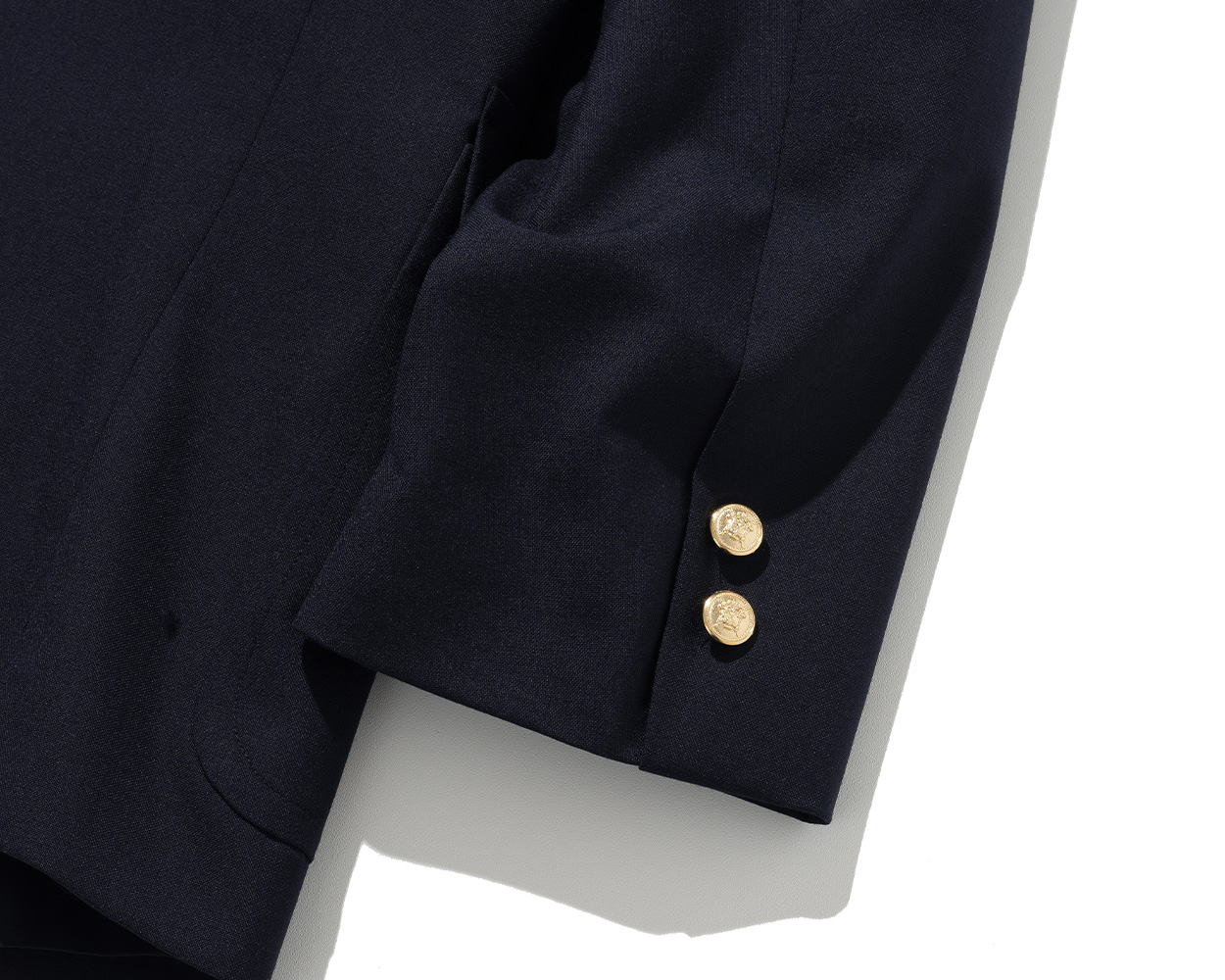 Fake sleeve buttons on Renacts blazer for easy sleeve alteration