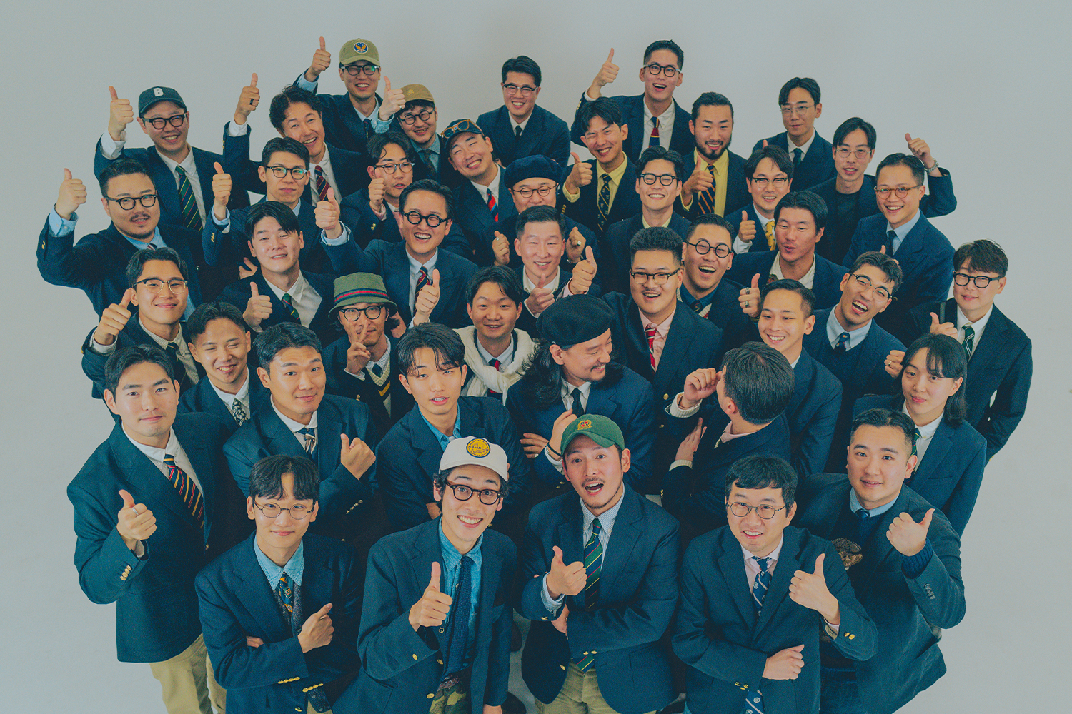 about 50 guys wears same navy blazer and thumbs up