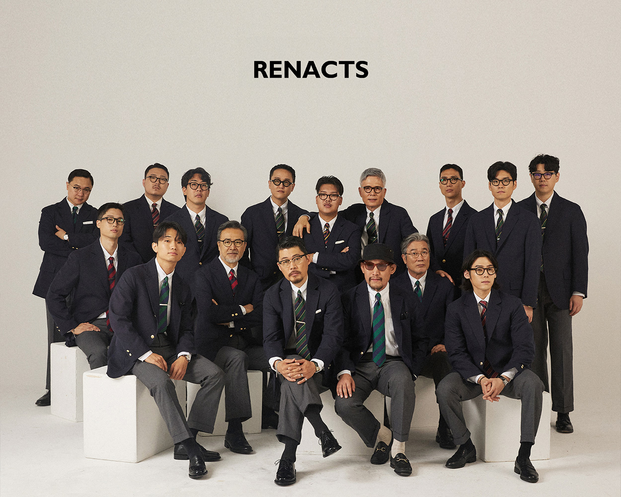 many gentlemen wears same navy brass button blazer