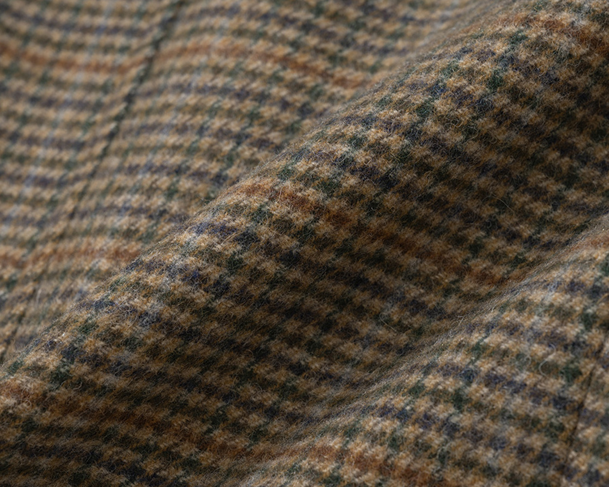 Close-up of classic brown and tan Gun Club check pattern