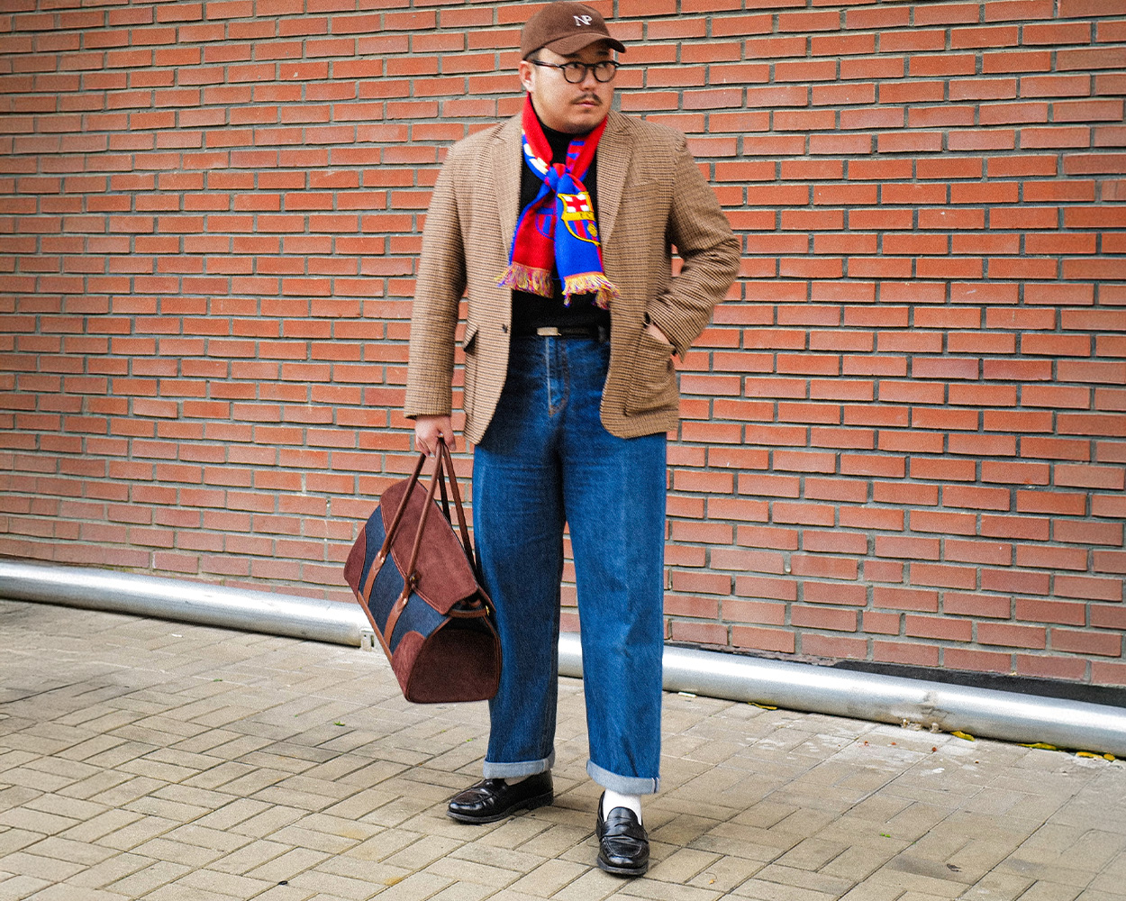 Gun Club jacket styled with football scarf, jeans and black knit