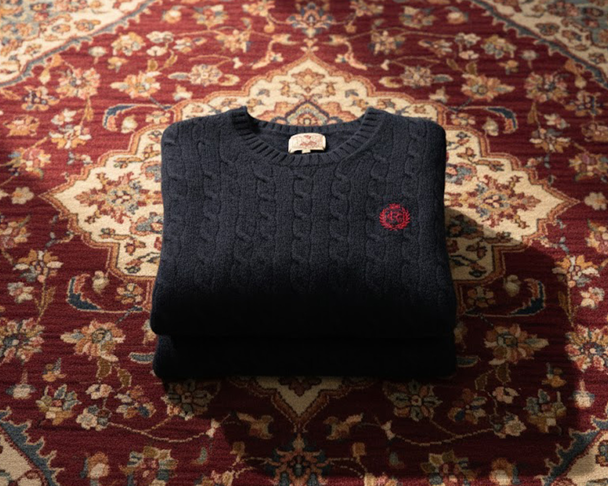Classic cable knit sweater styled in an Ivy menswear setting