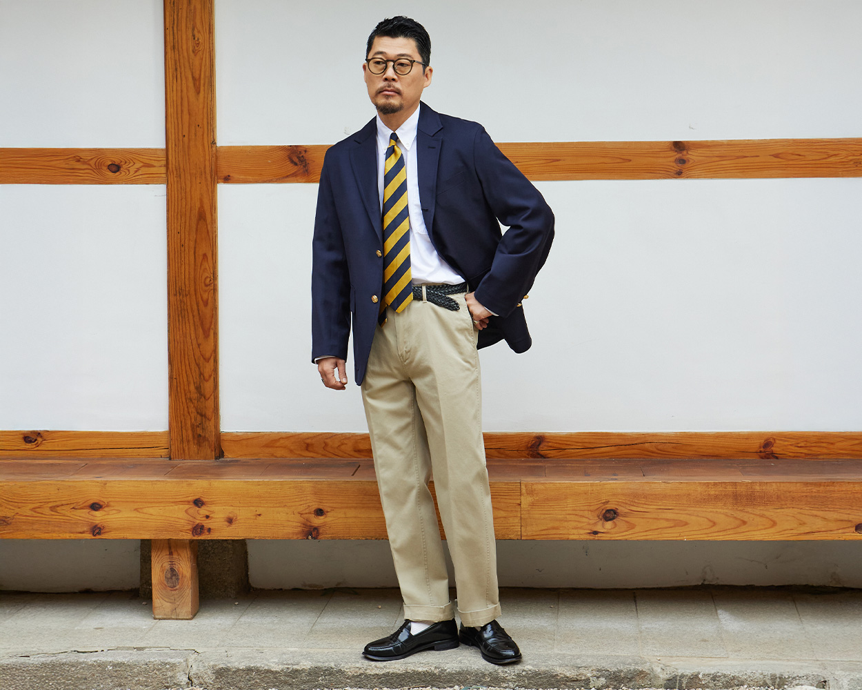 Classic Ivy Style outfit featuring a timeless navy blazer