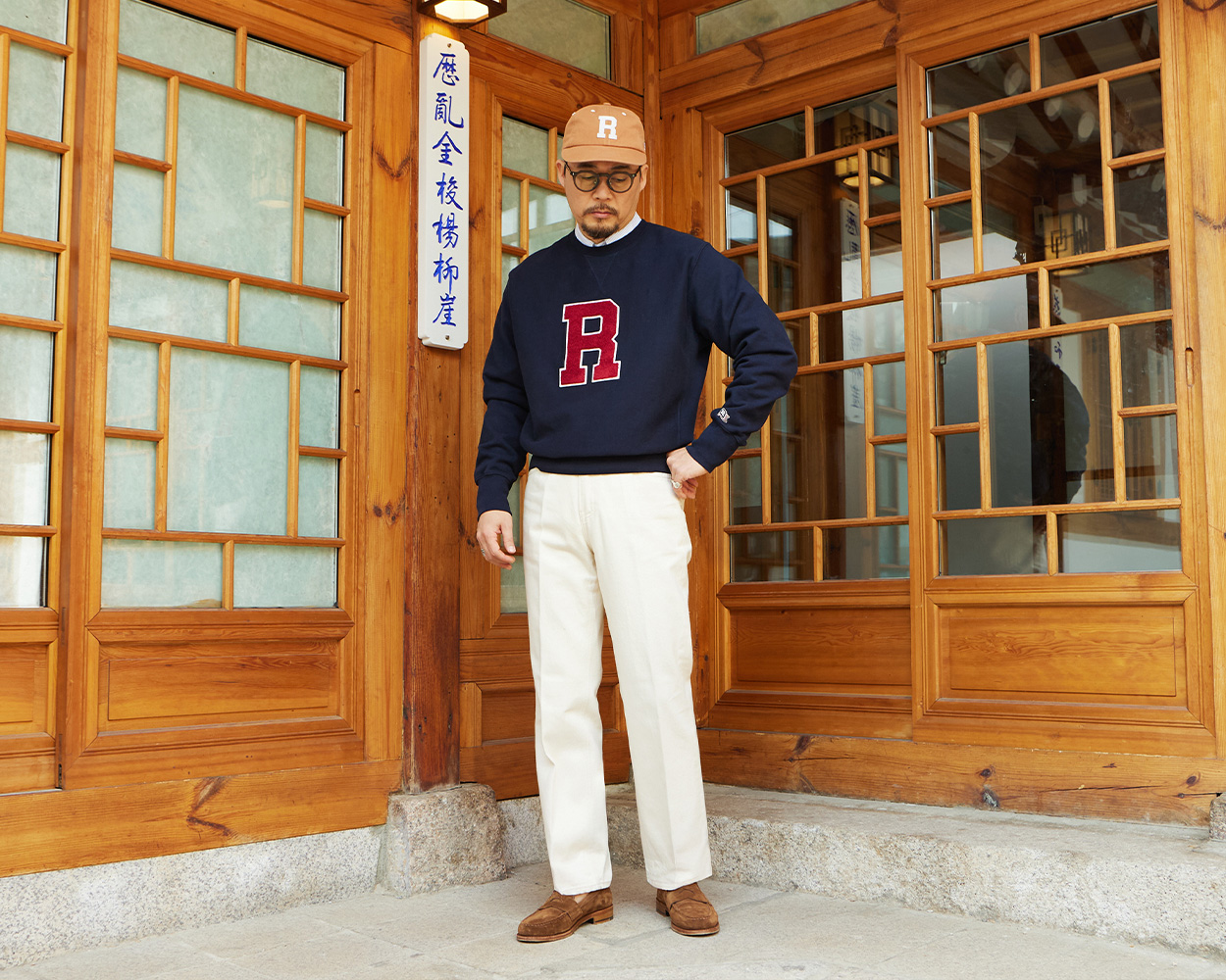 Everyday Ivy Style outfit combining knitwear and chinos for modern menswear