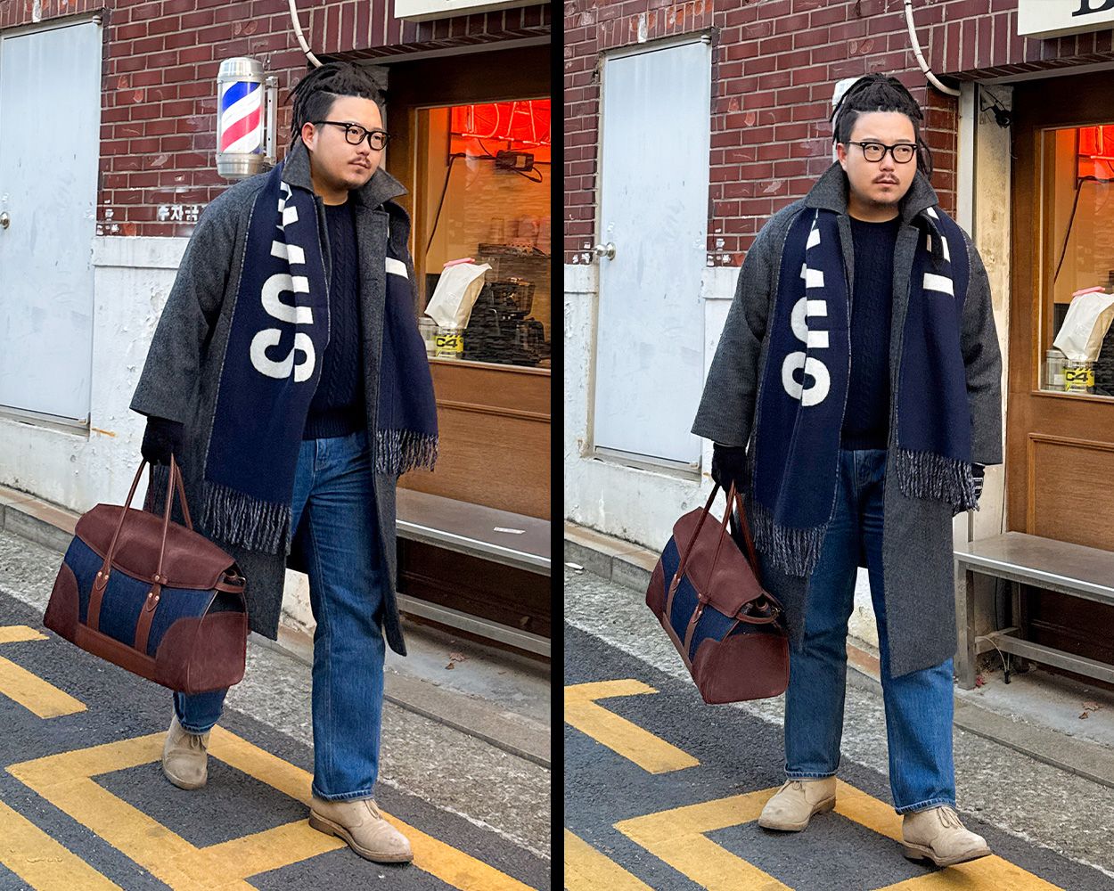 Classic balmacaan coat paired with a large-logo Jacquemus scarf, blue denim, and suede desert boots for a bold and contemporary casual look