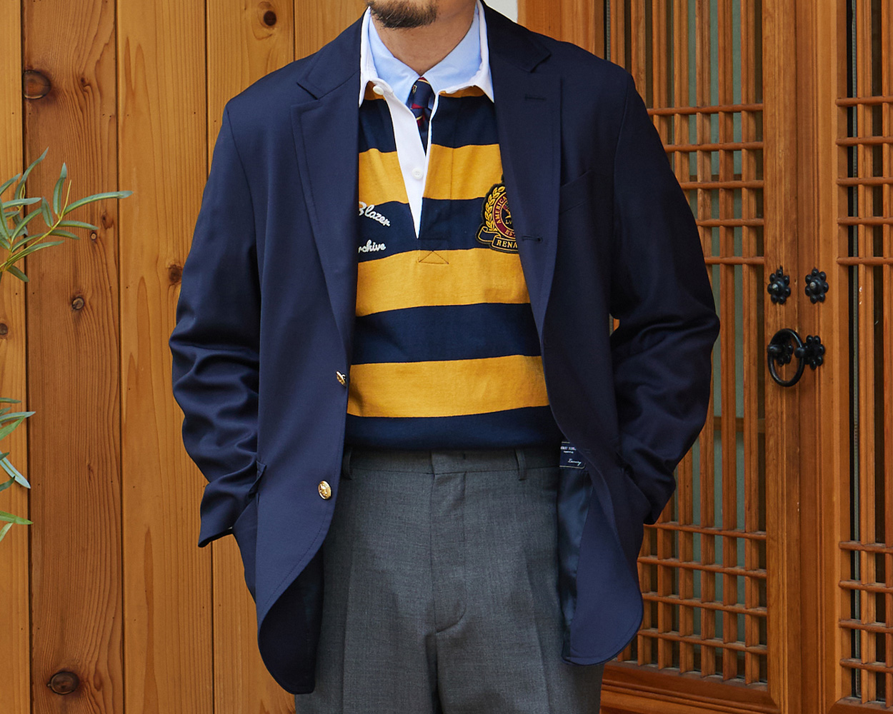 Timeless navy blazer outfit representing the enduring spirit of Ivy Style