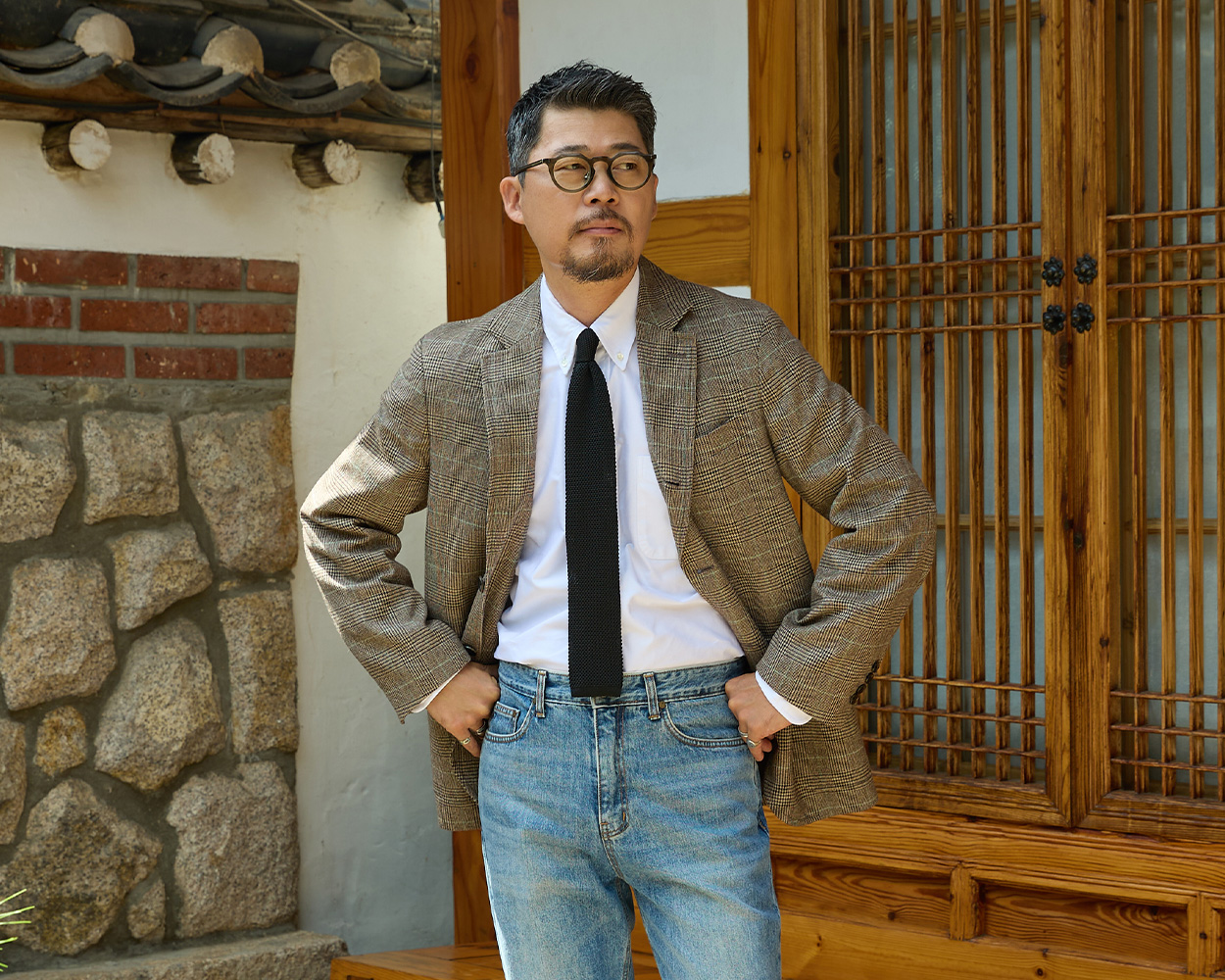 Glen Check Blazer showing its classic checked pattern and tailored silhouette