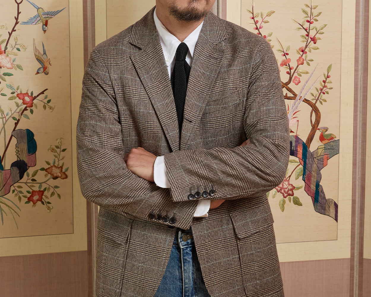 Renacts interpretation of American Trad tailoring with Glen Check influence