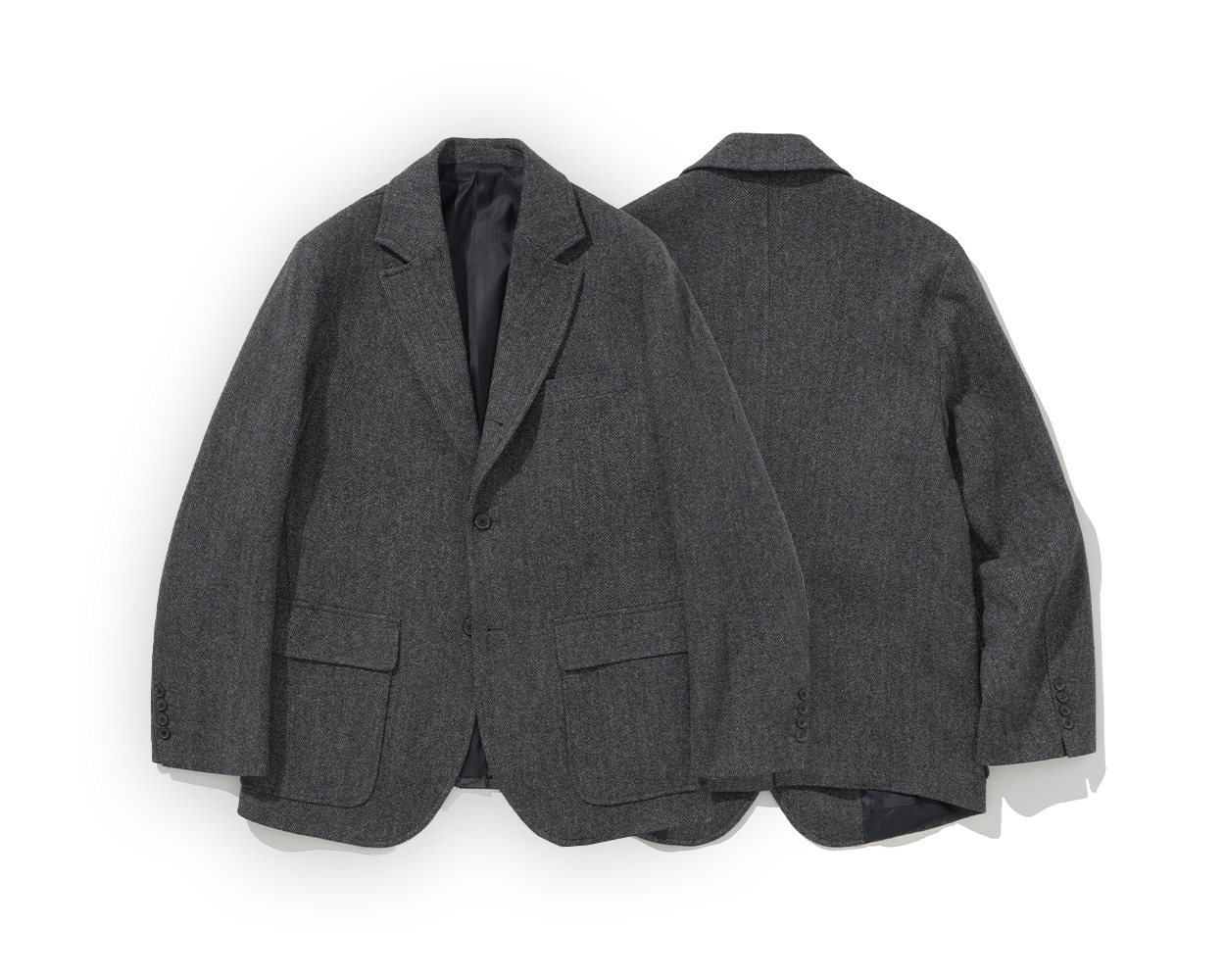 Detailed construction of Renacts herringbone tweed jacket made from British wool