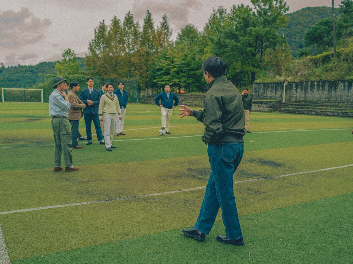 Necktie history origin — a repp stripe tie showing the classic pattern that traveled from British regiments to American Ivy League campuses