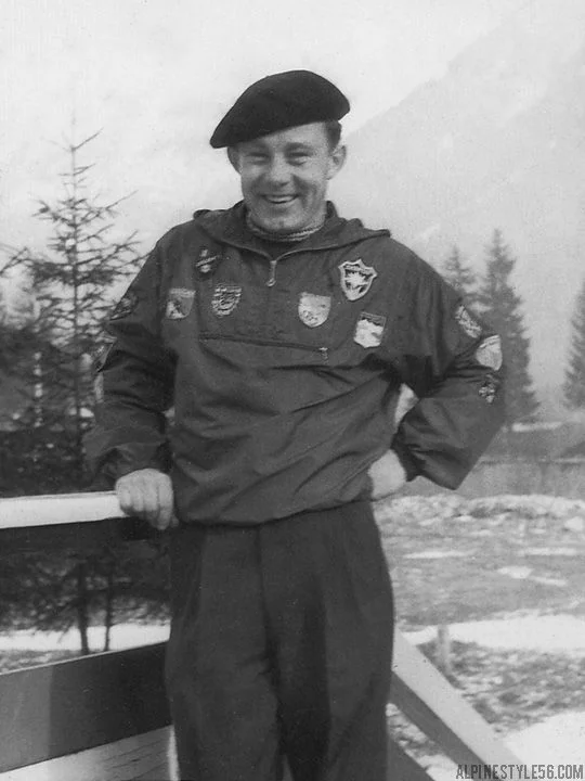 Anorak jacket history — 1950s alpine skier in a patches-covered pullover anorak and beret, Chamonix era
