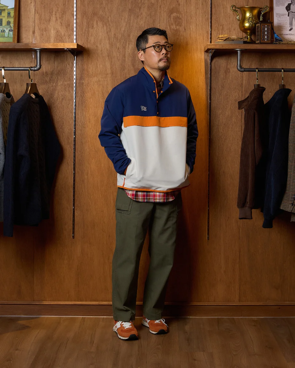 Anorak layered over an oxford shirt for Seoul Traditional Heavy Ivy outerwear styling