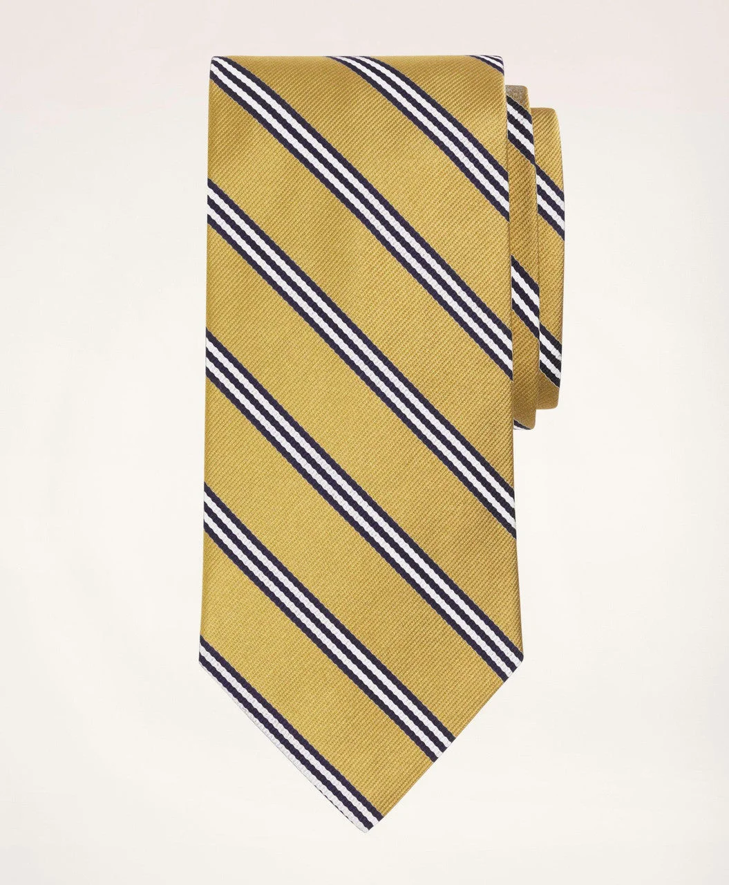Brooks Brothers history: the BB#1 Rep Tie in gold and navy — silk repp with the American stripe direction that Brooks Brothers introduced in 1902, reversed from the British regimental pattern