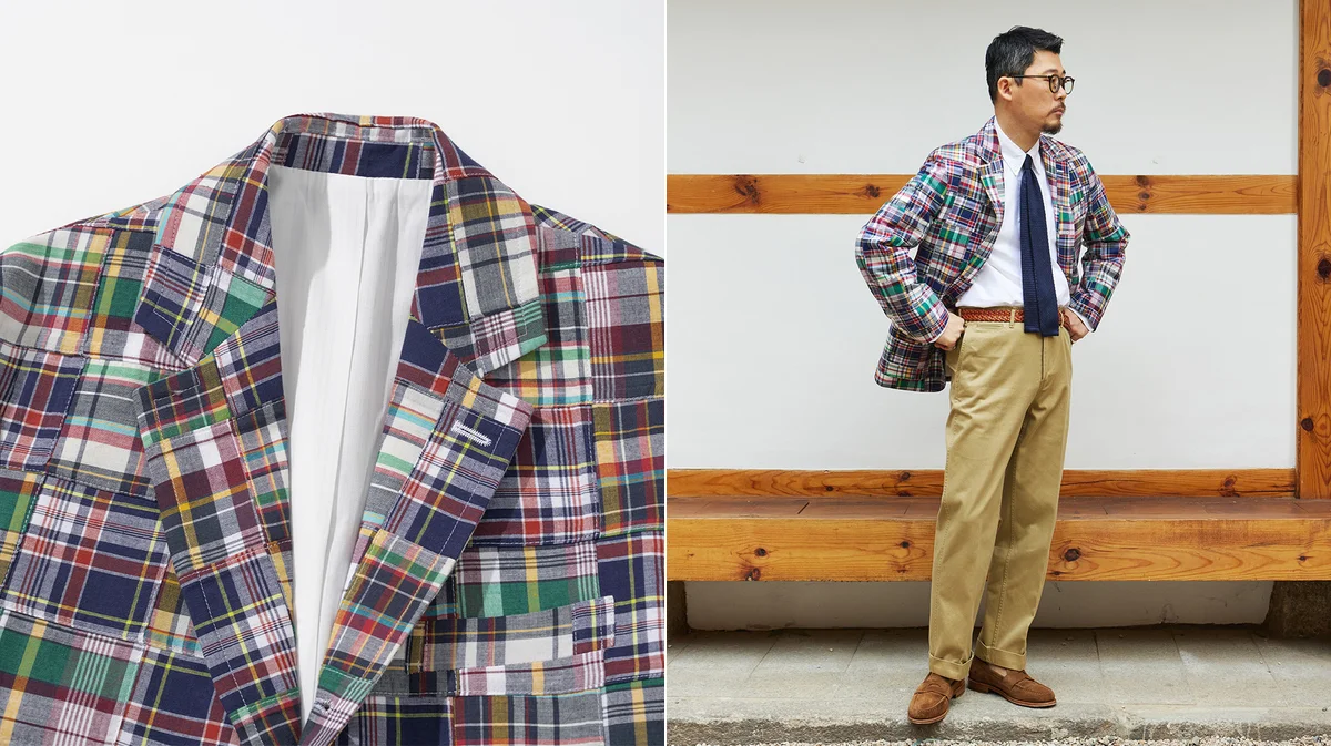 Well-maintained navy cotton blazer on wooden hanger showing proper spring blazer care