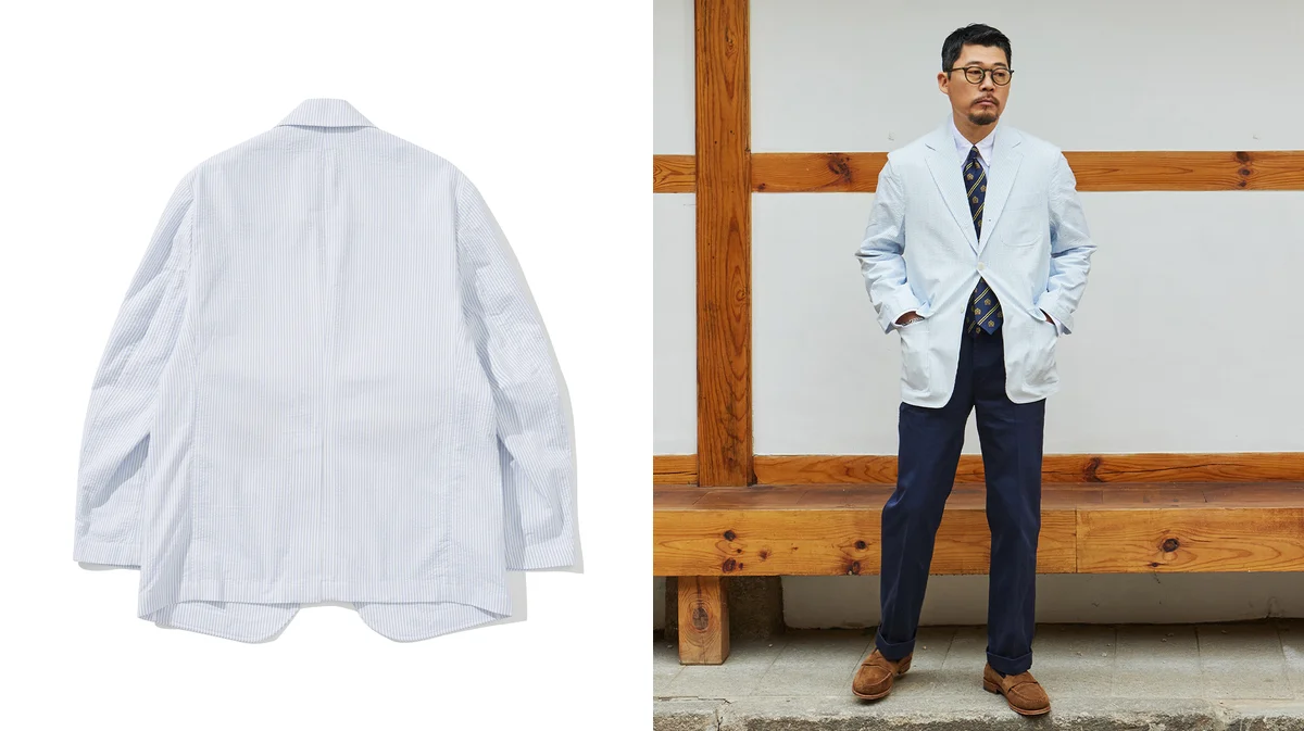 Unlined cotton blazer in navy showing lightweight spring construction