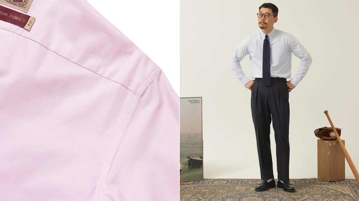 Oxford shirt cuff visible below blazer sleeve at the correct half-inch length