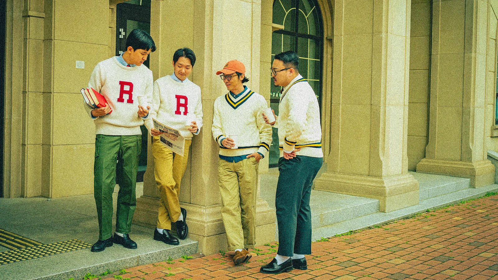 Renacts editorial showing a man wearing slim fit chinos with an oxford shirt on the streets of Seoul