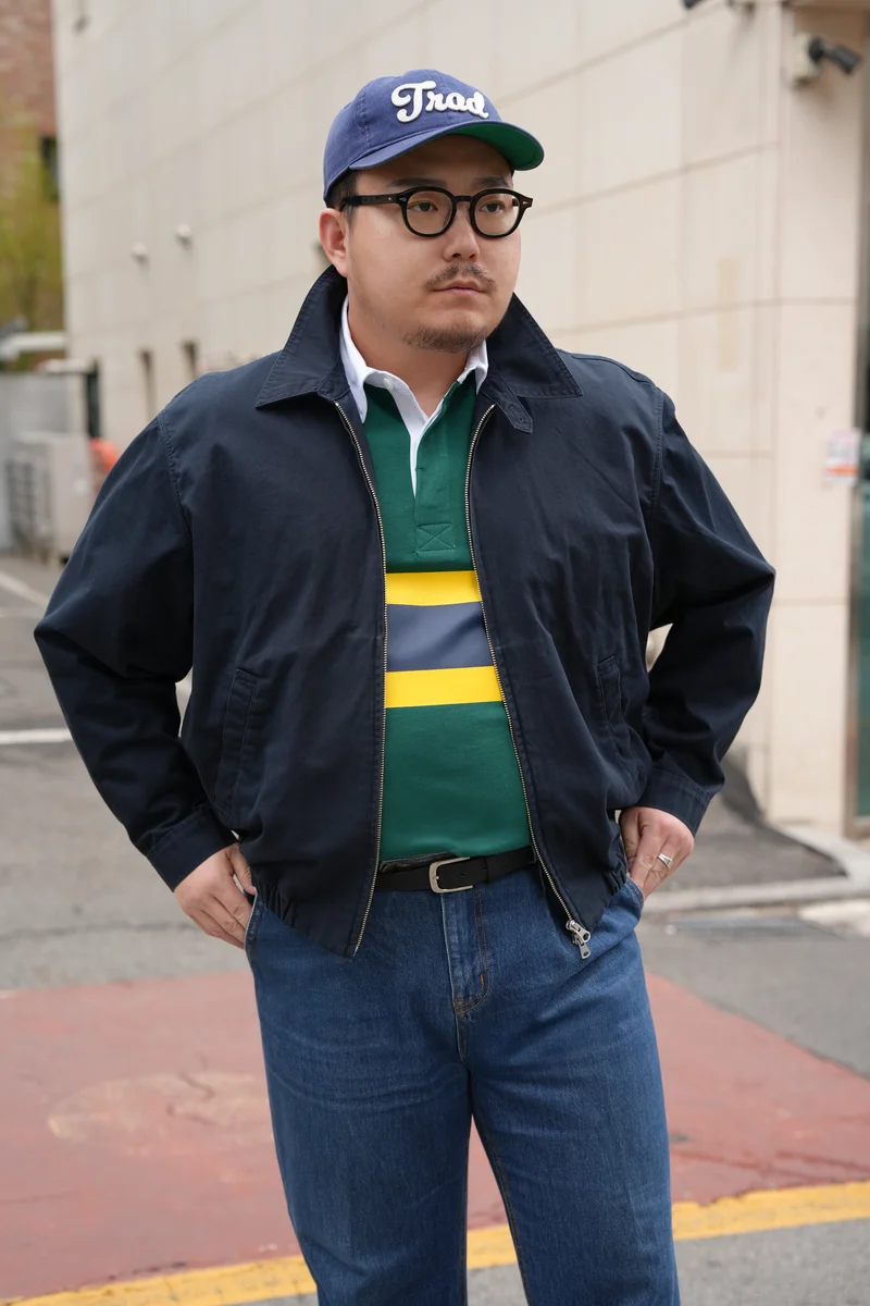 Harrington jacket casual outfit — full-body navy harrington jacket and rugby shirt look in Seoul street setting