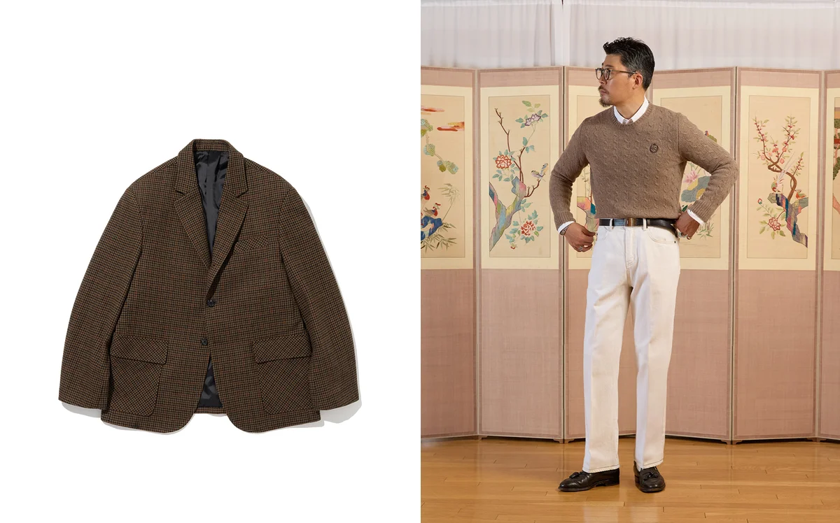 Crewneck sweater layered under a navy blazer for a cold-weather casual outfit