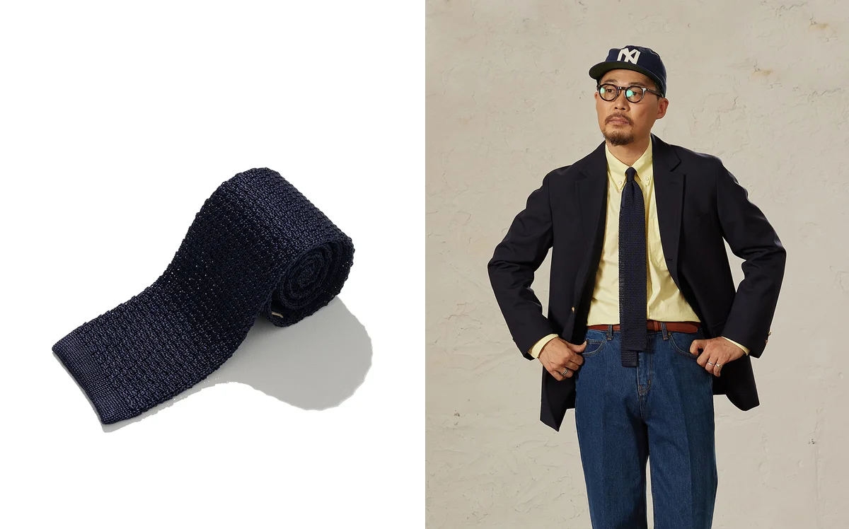 Oxford cloth button-down shirt paired with a knit tie for a relaxed yet intentional look