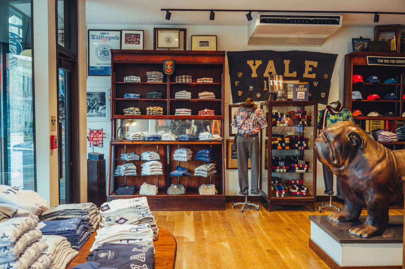 J.Press history: the New Haven flagship interior with Yale pennant and Handsome Dan bulldog at the Elm Street store