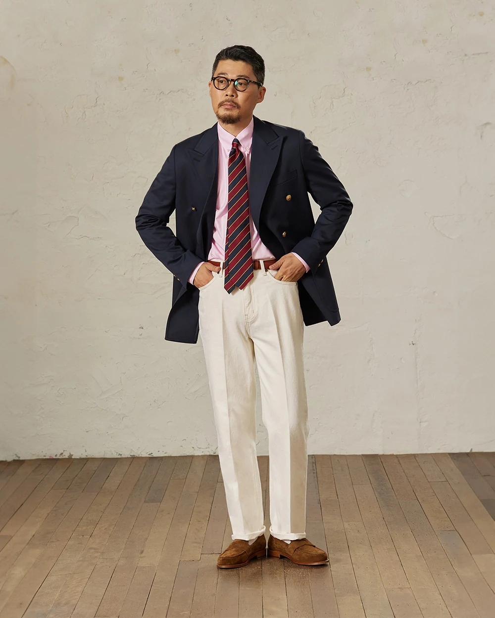 Navy gold-button blazer outfit double-breasted — DB blazer, pink OCBD, burgundy regimental rep tie, cream cotton jeans, plaque belt, brown suede penny loafers, modern double-breasted casual
