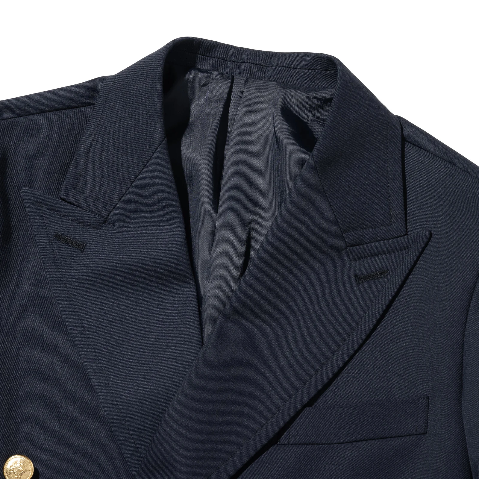 Renacts navy gold-button double blazer peaked lapel detail — sharp upward-angled lapel point, satin lining