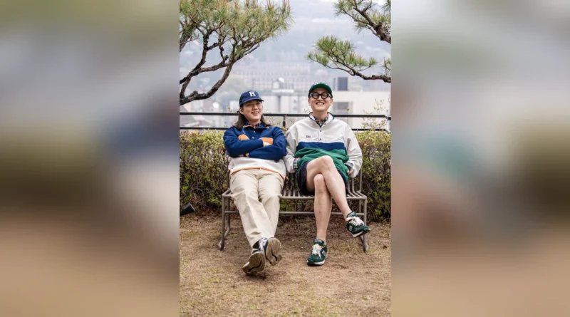 Anorak outfit men spring — featured thumbnail, navy and green Renacts New Trad Anorak Pullovers on a Seoul bench