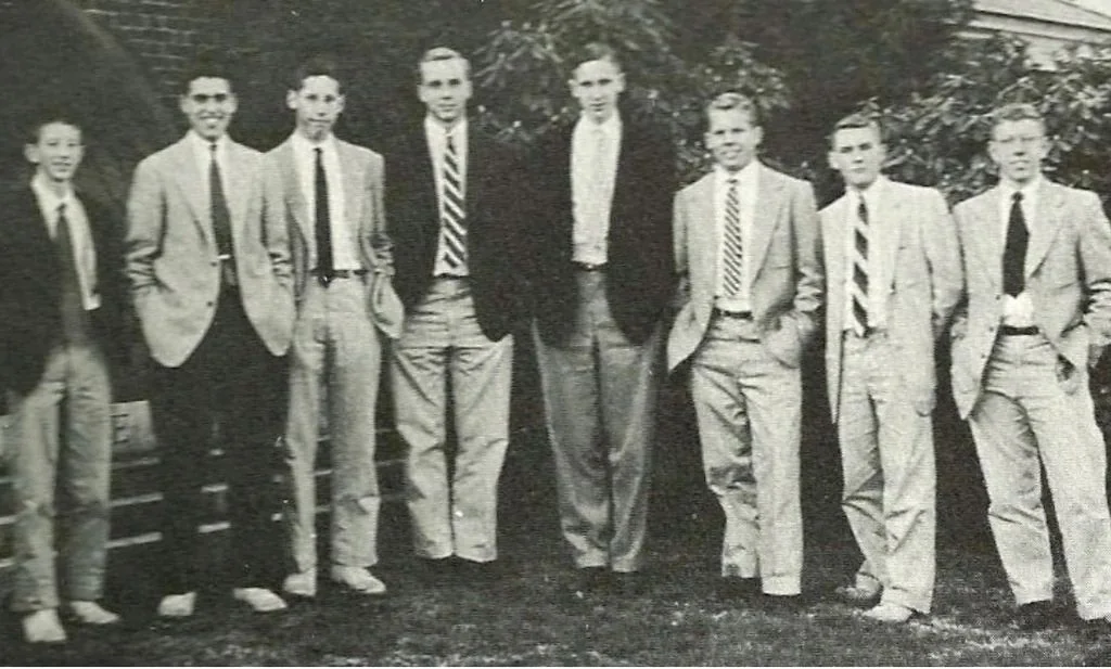 Yale Ivy style — mid-20th century Yale students lined up in the canonical sack jacket, rep tie, and lightweight trousers kit documented in the 1965 Dress Study Group guidelines