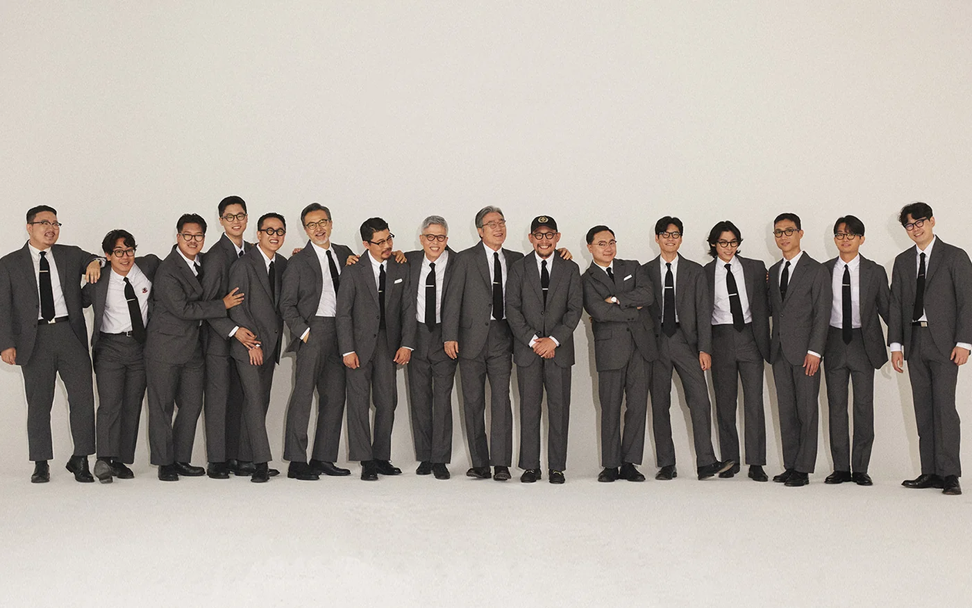 SEOUL Traditional team in grey suits — the Seoul interpretation of American Ivy