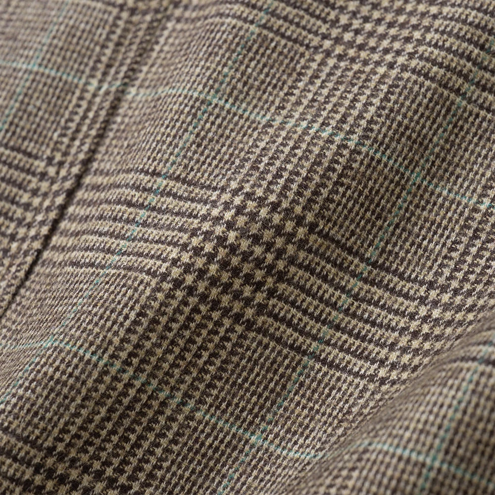 Glen Check fabric close-up — Glenurquhart small base check overlaid with larger overcheck, beige and brown tones with pale blue overcheck windowpane line