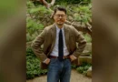 Sport coat essentials thumbnail: Renacts Gun Club tweed sport coat with white OCBD navy knit tie brown leather belt and dark denim photographed at a hanok pine garden, centered with blurred background — Saturday-tailored Trad register in Seoul