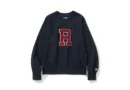 Reverse weave sweatshirt thumbnail — Renacts Letterman Ivy Sweatshirt Navy with chenille R house mark on clean white background