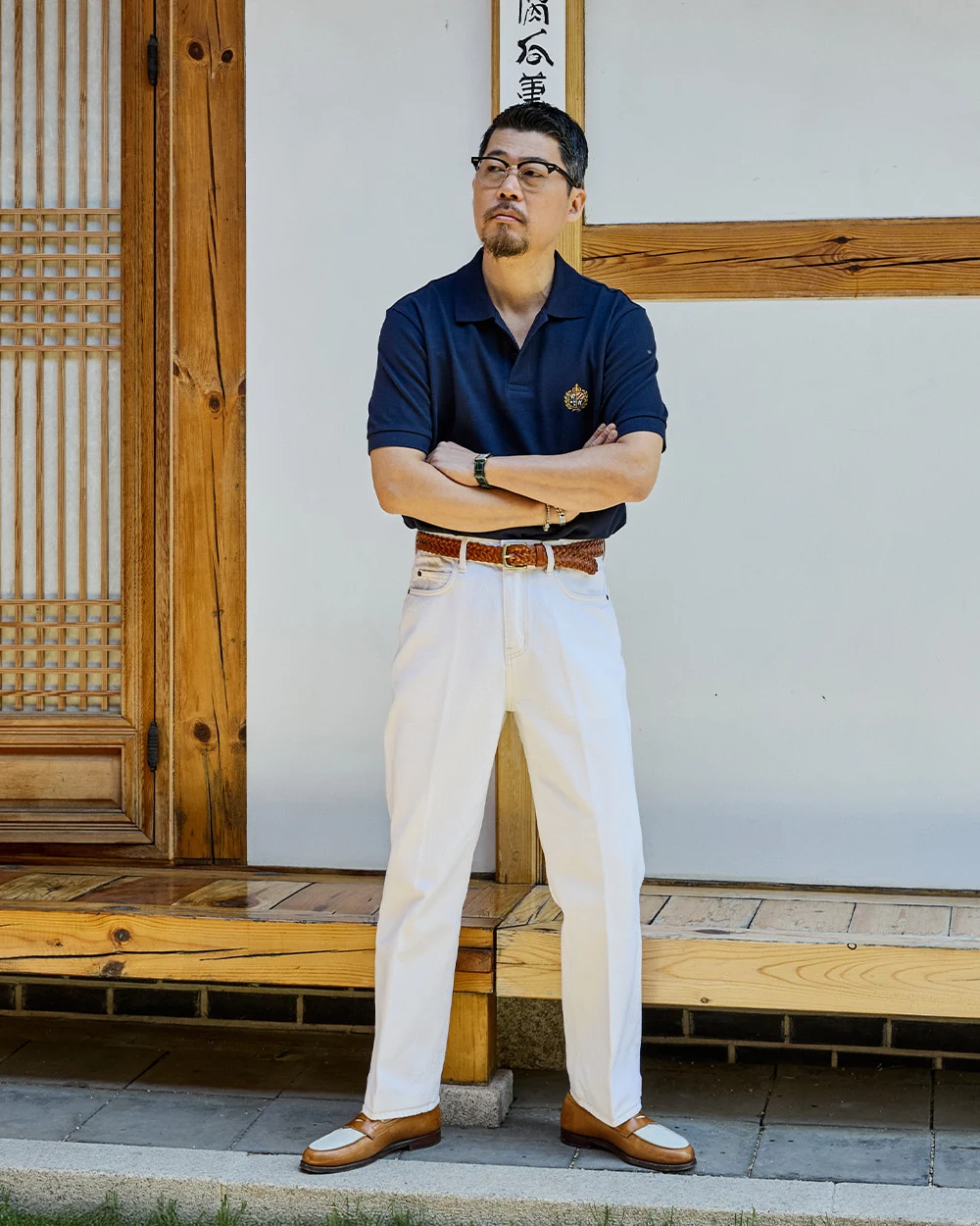 trad denim Cream with navy pique polo and spectator loafer, the summer country club register