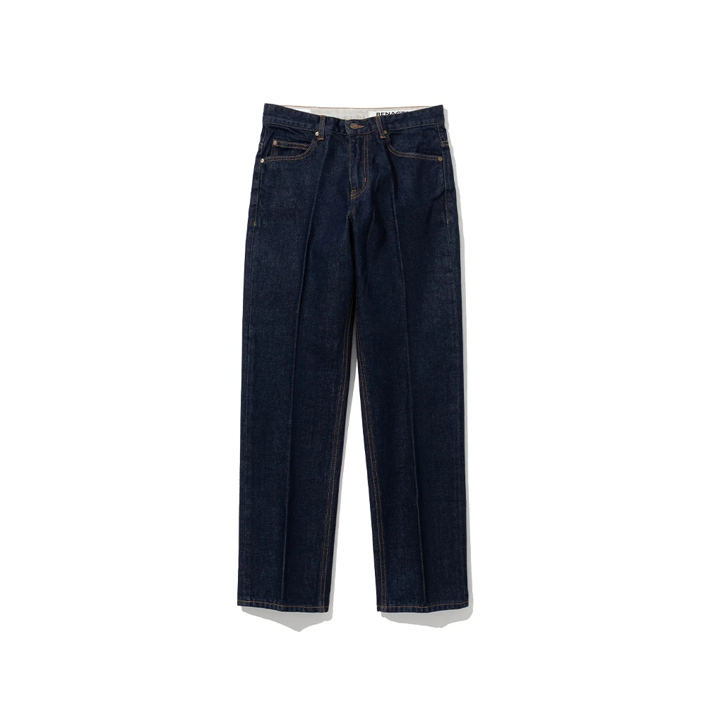 trad denim Indigo register: Renacts Tailored Straight in raw indigo, the canonical baseline of the lookbook