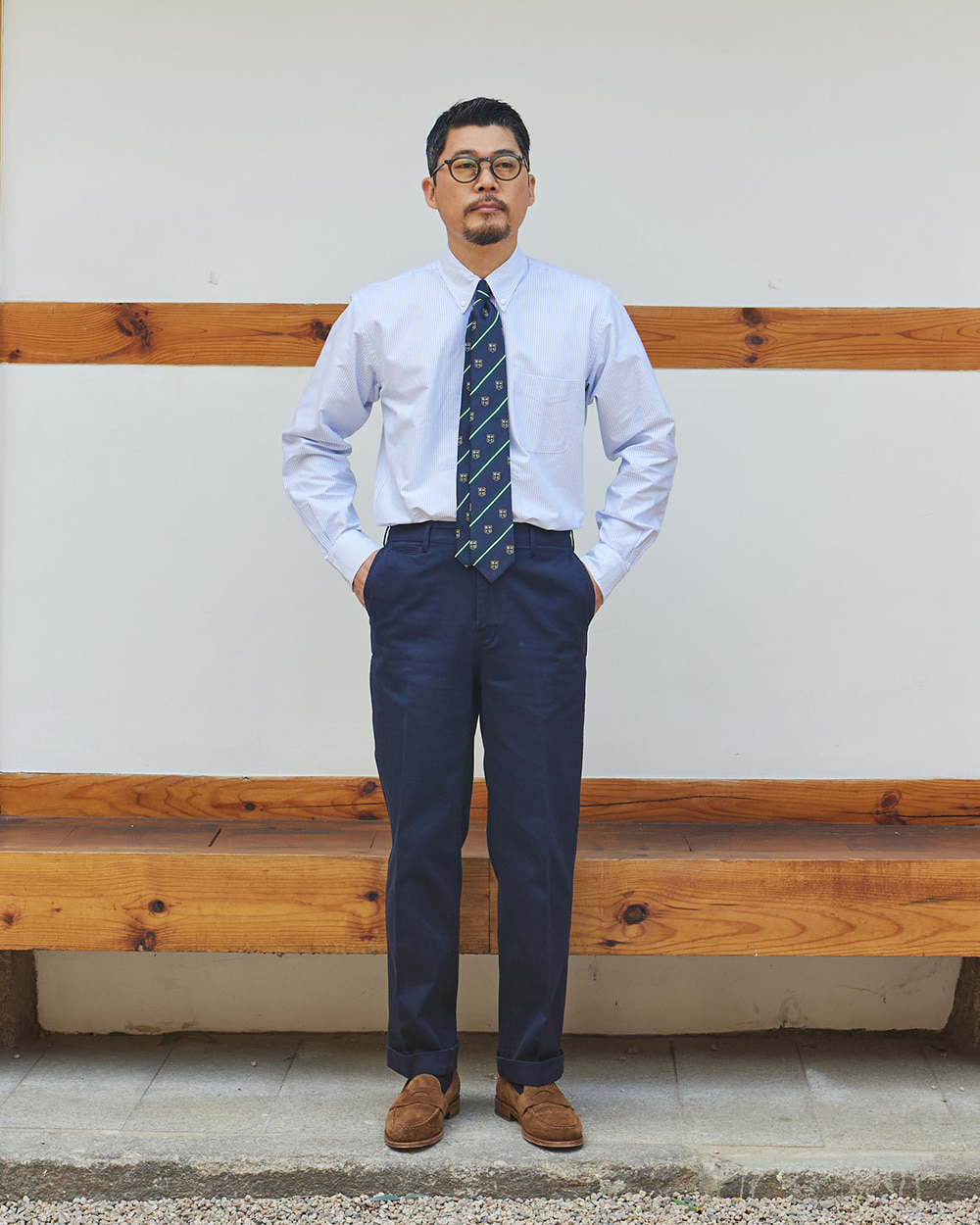 University stripe oxford cloth button-down shirt with a soft collar roll — the foundation of ivy style