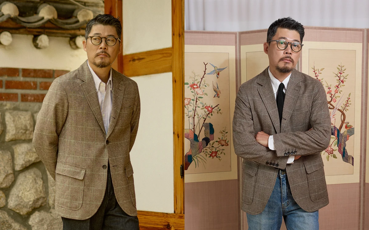 Abraham Moon glen check tweed sack cut blazer — the cloth and natural shoulder up close, and worn with a white oxford and black knit tie (Renacts FW25)