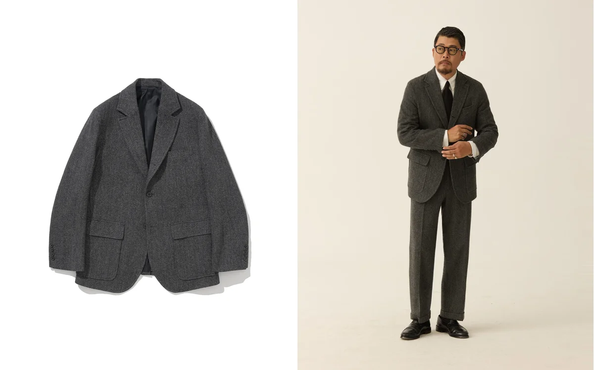 Grey herringbone sack cut blazer with natural shoulder and 3-roll-2 button stance
