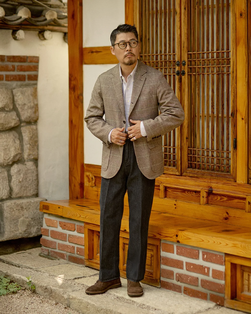 Outfit F: Abraham Moon glen check tweed blazer, white OCBD open at the collar, charcoal wool trousers, brown suede loafers — hanok courtyard, Renacts FW25 lookbook, Seoul (limited sizes)