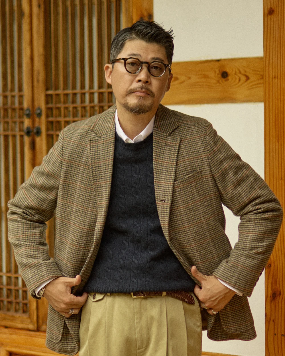 Outfit A: gun club check sport coat over a navy cable crewneck and white OCBD, khaki chinos — Renacts FW25 lookbook, Seoul