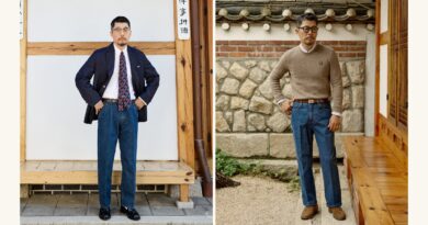 modern ivy style proportions: navy blazer with a crest repp tie over pleated wide-leg denim beside a cable knit crewneck with wide-leg denim, both at a Seoul hanok