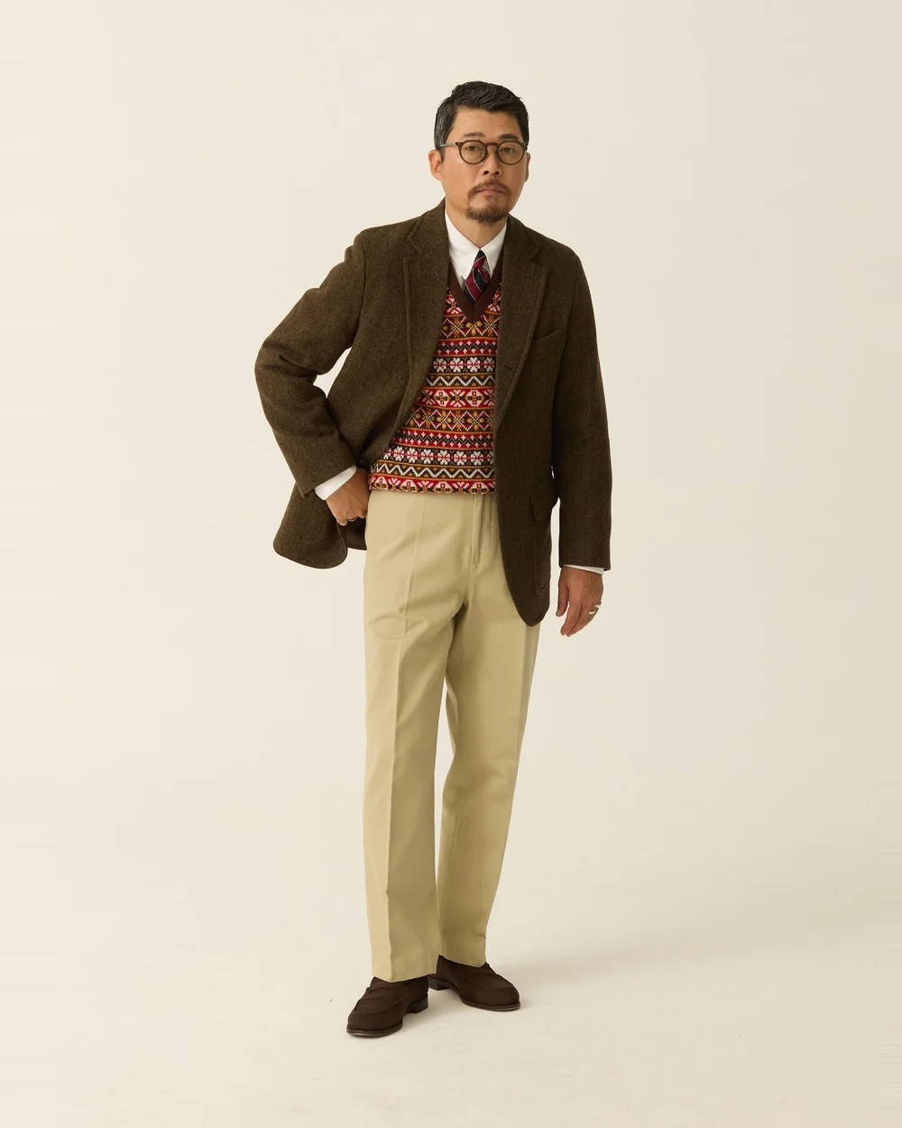 Olive brown herringbone blazer, Fair Isle vest, khaki chinos, brown suede loafers — Renacts FW26 lookbook