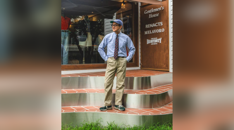 Blue shirt and patterned tie with khaki chinos and green sneakers outside Gentlemens House in Seoul, original photograph centered with blurred side padding.