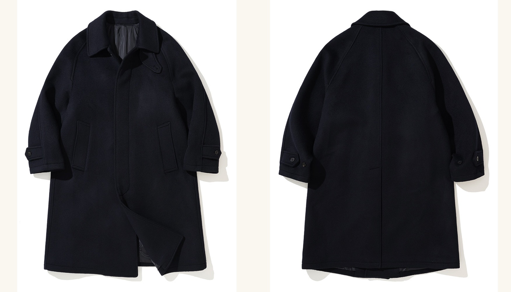 Navy brushed wool balmacaan coat laid flat, front and back side by side: raglan sleeves, a fly front with no visible buttons, slanted pockets, and an unbroken back with a single vent