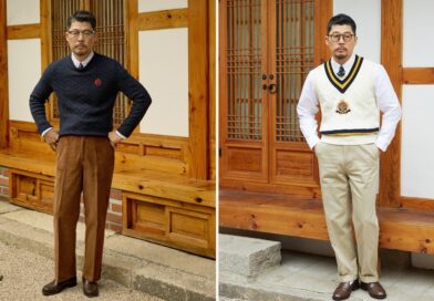 How to wear a cable knit sweater, Ivy style: a navy cable crewneck over a white button-down with brown corduroys, beside an ivory cotton cricket vest with a crest over a white oxford and tie